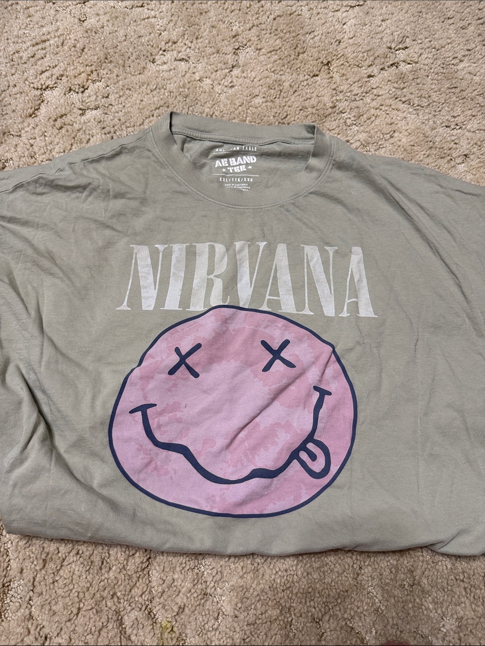 American Eagle Outfitters Green Nirvana Graphic Tee with Pink Smile Logo